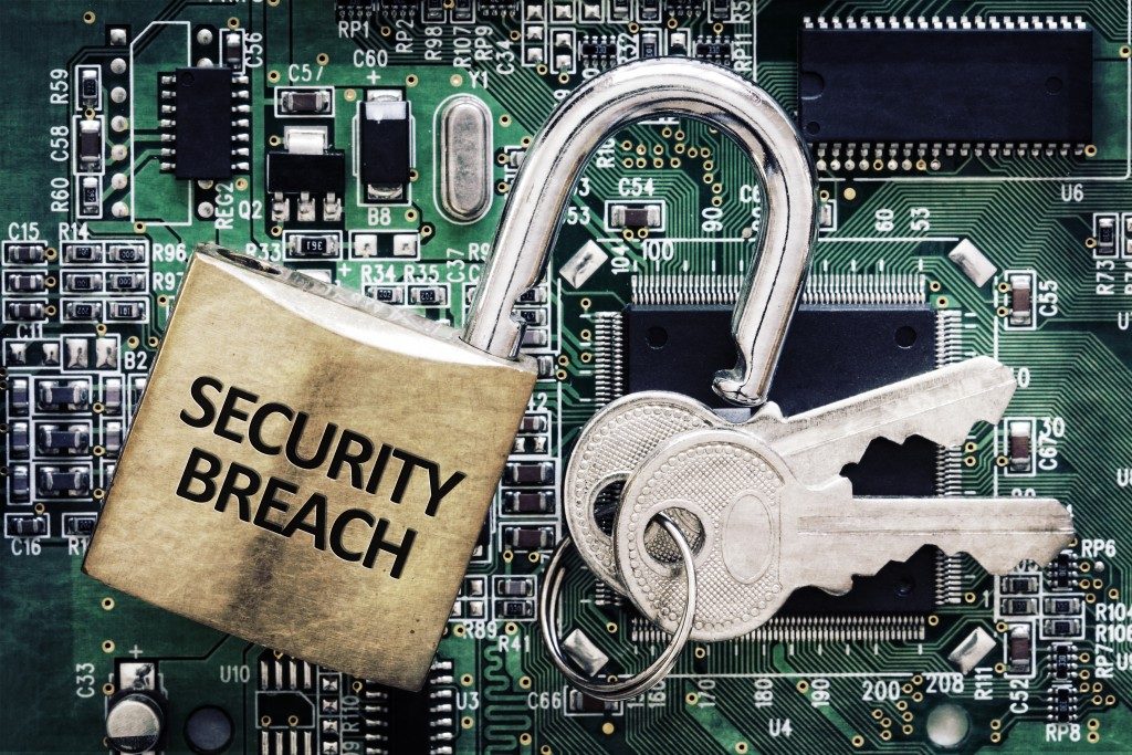 security breach written on padlock
